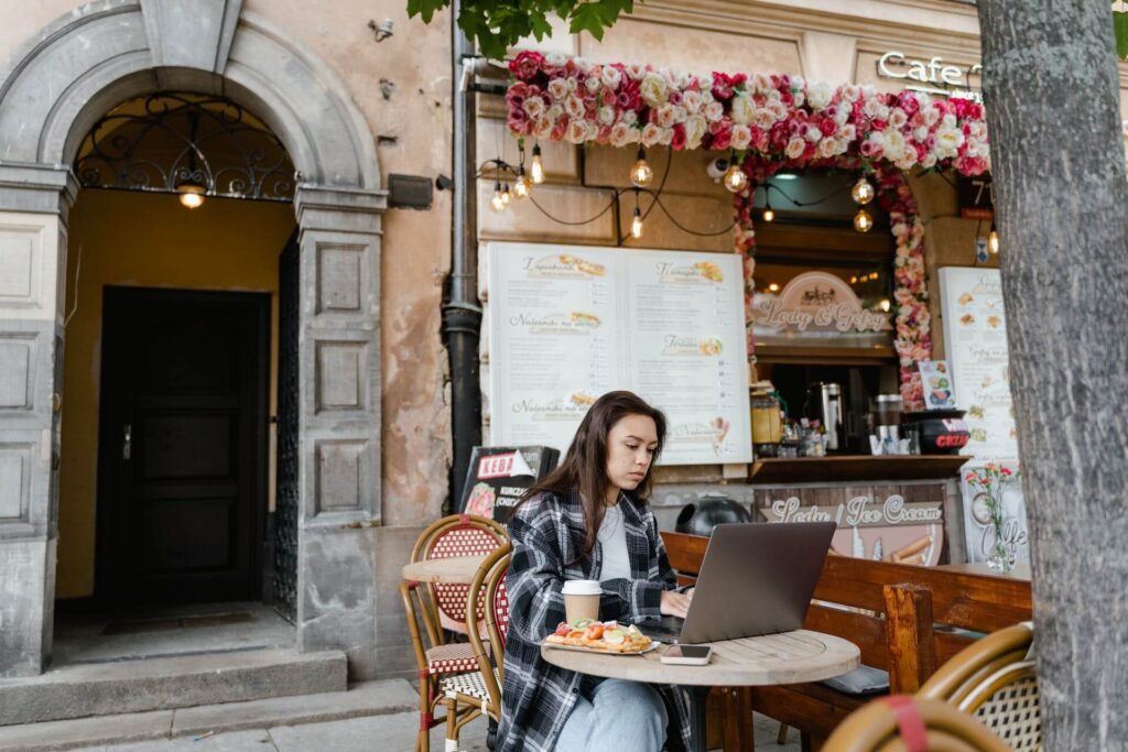 Woman working from a cafe